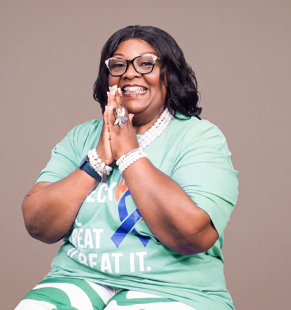 Stephanie Crawford smiling in a Beyond the Bag awareness shirt